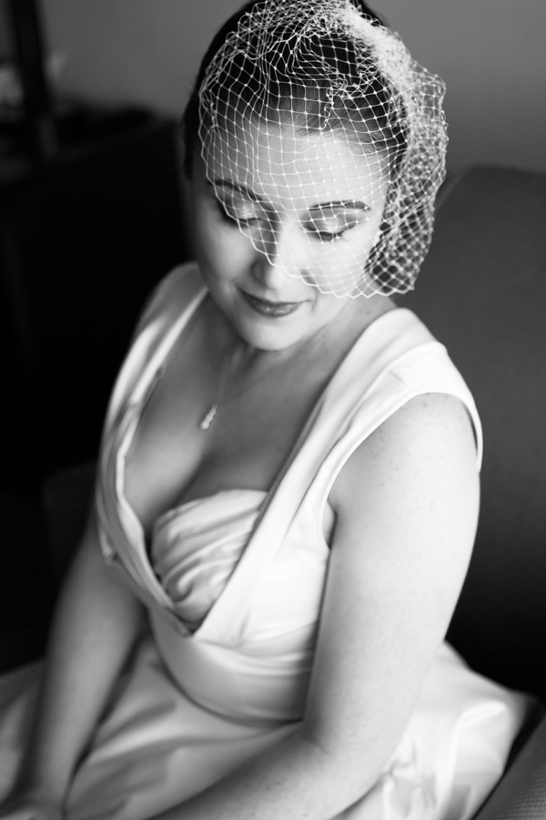 Black and white bridal portraits are one of my favorite things to capture on a wedding day. Jessica was a classic bride with her striking looks and birdcage veil.