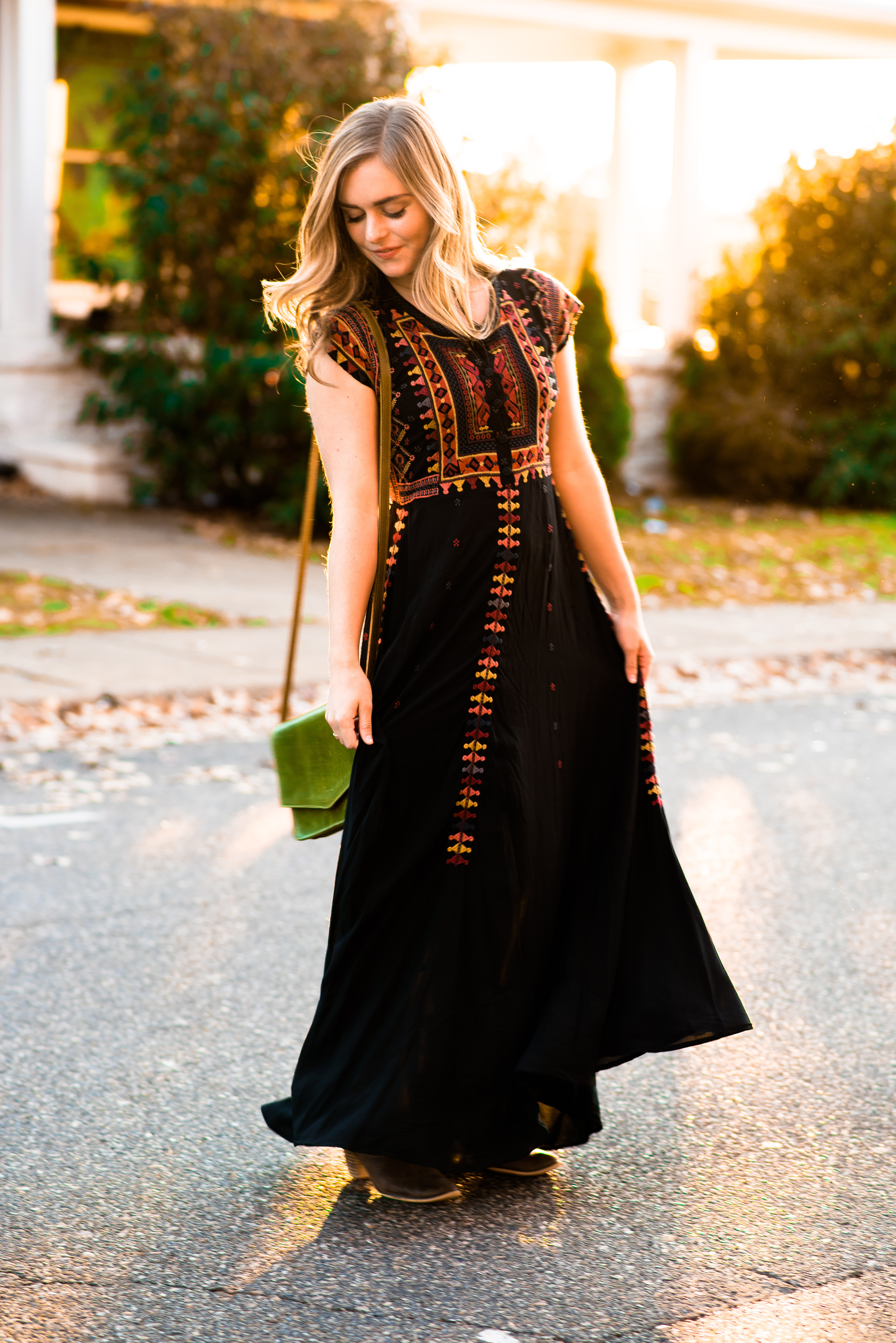 Kayla poses in a Johnny Was dress during a promotional shoot for The Yellow  Button Boutique and 22807 Magazine in downtown Harrisonburg.