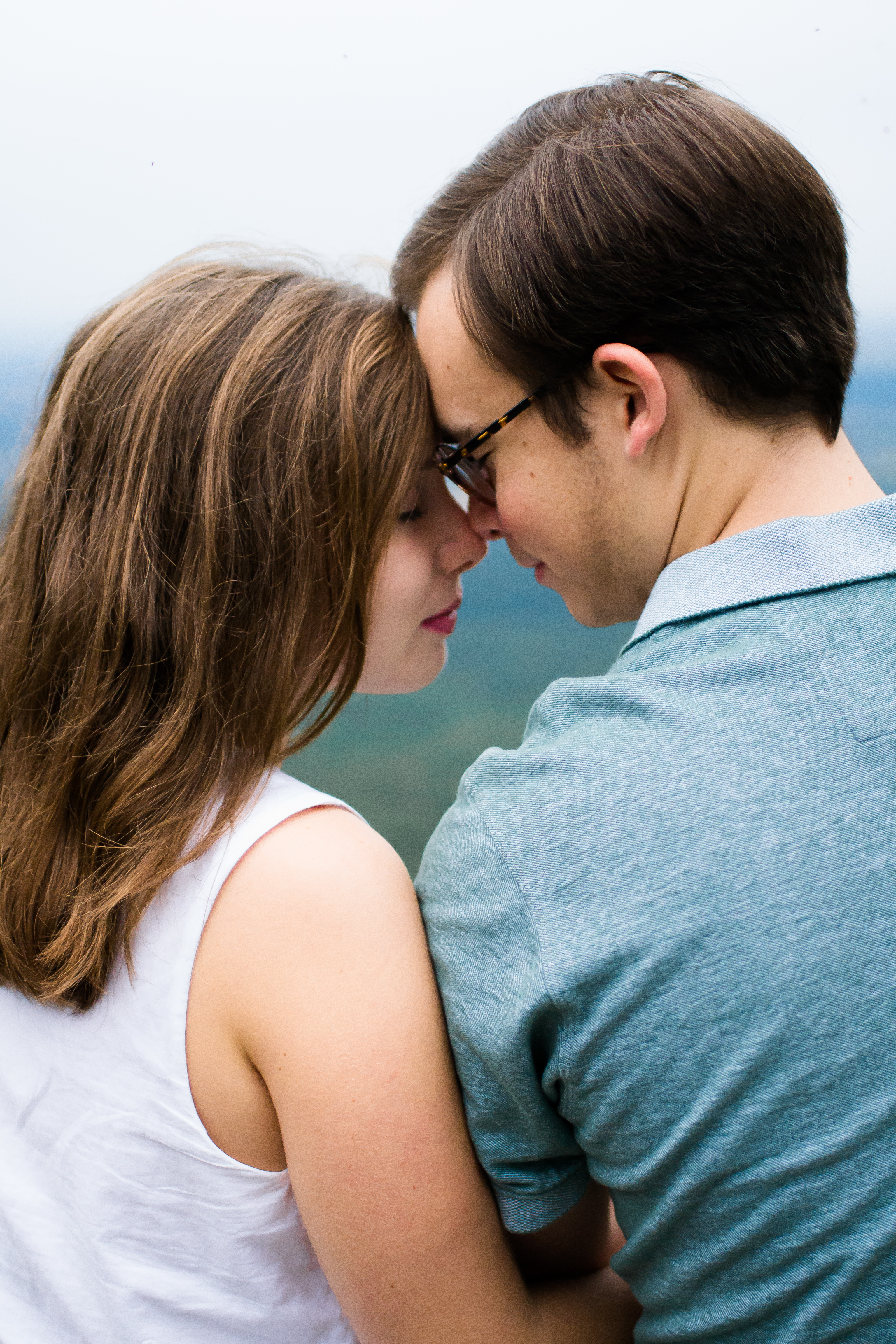 We took a small hike at dawn in hopes of a brillant sunrise session, but once we hit the mountain top found only fog. Despite the turn of events, we embraced the weather for Lily & Canaan's early morning session. 